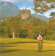 Golf course with Mt Popa behind