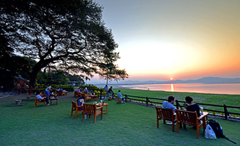 Sunset view over Ayeyarwaddy river from Thande hotel garden