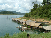 Boating on Chewlan dam lake in Khao Sok national park