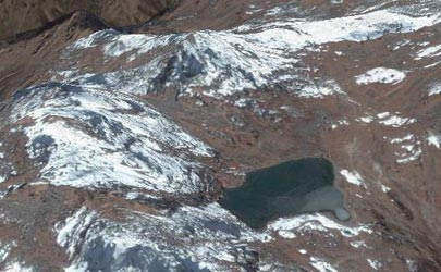 Cold water lake near the peak of 4400 meter Kyerpa Danda peak