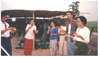 Eating water melon along the Yangon - Bago highway