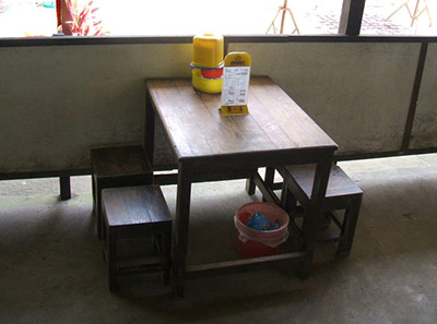 A table and chairs in a restaurant