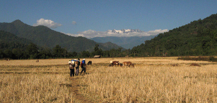 Snow capped mountain peaks far far away