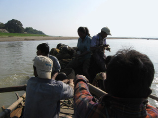 On a fishing boat on Ayeyarwaddy river - a row boat