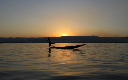 A fishing boat at sunset