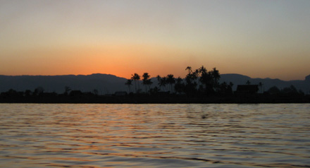 Water, community of Inthars, Shan hills and setting sun