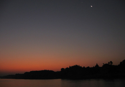 Early morning crescent moon over the ancient temples