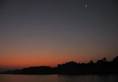 Early morning crescent moon over the ancient temples